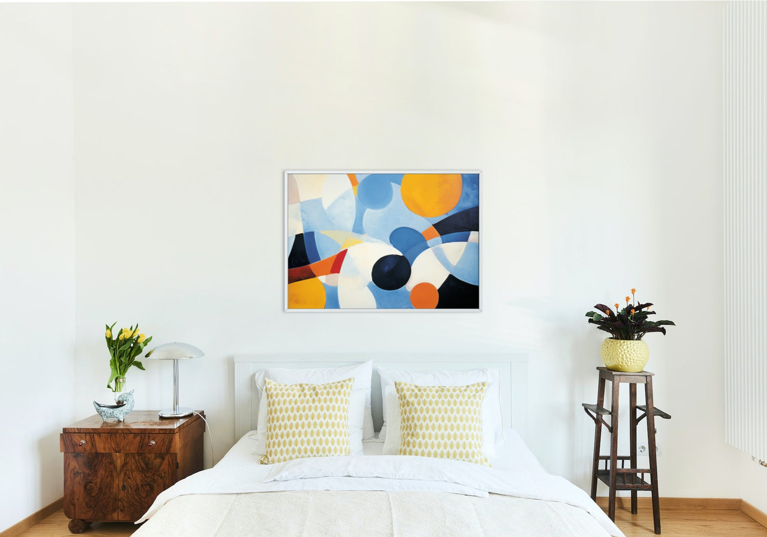 blue and orange wall art in master bedroom above bed